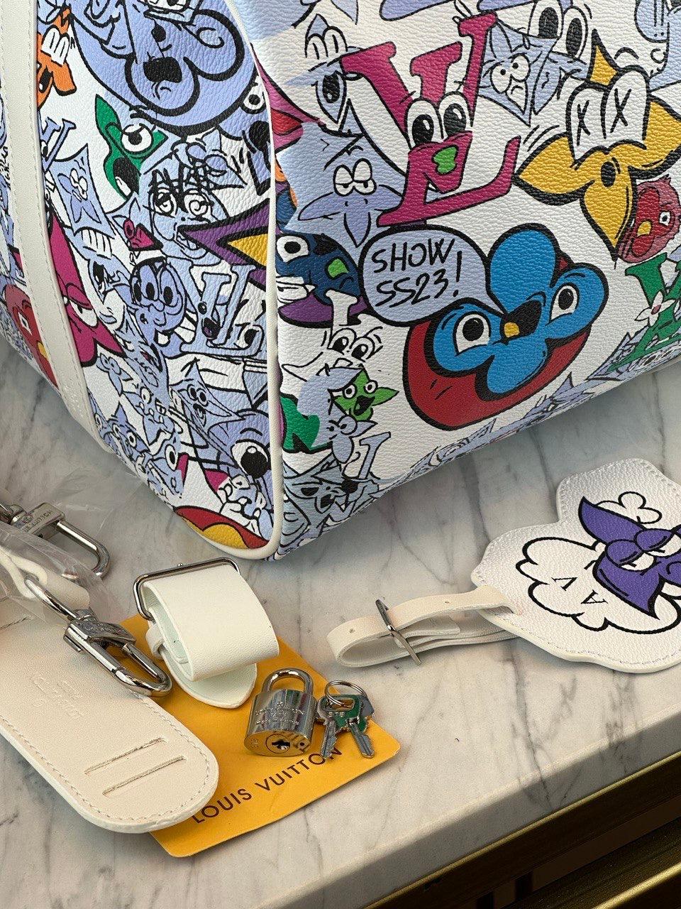 Louis Vuitton Keepall Bandouliere 50 - Glimmer of Luxury