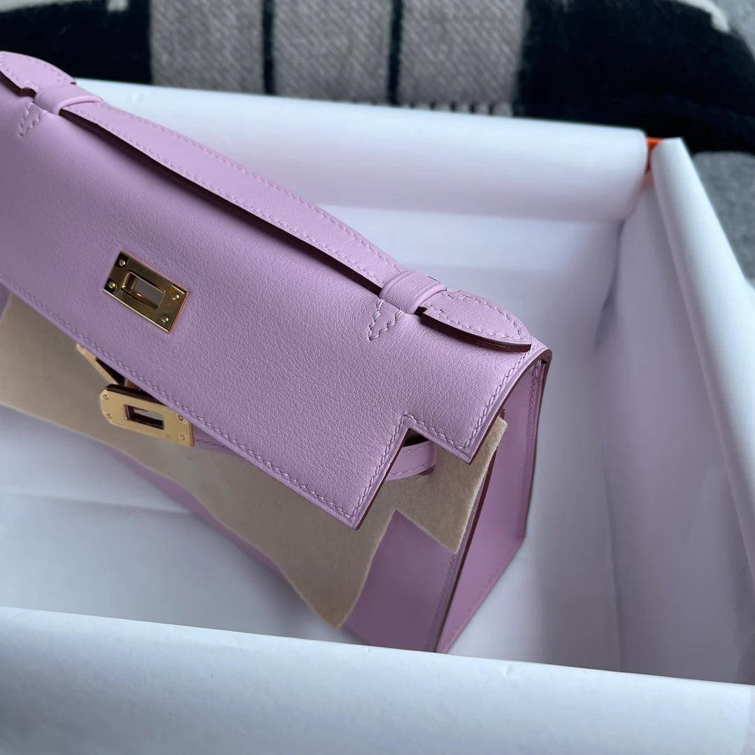 Hermès Kelly Pochette Swift Deri̇ Leylak Rengi Sylvestre Altın Donanımlı (GHW) - Glimmer of Luxury