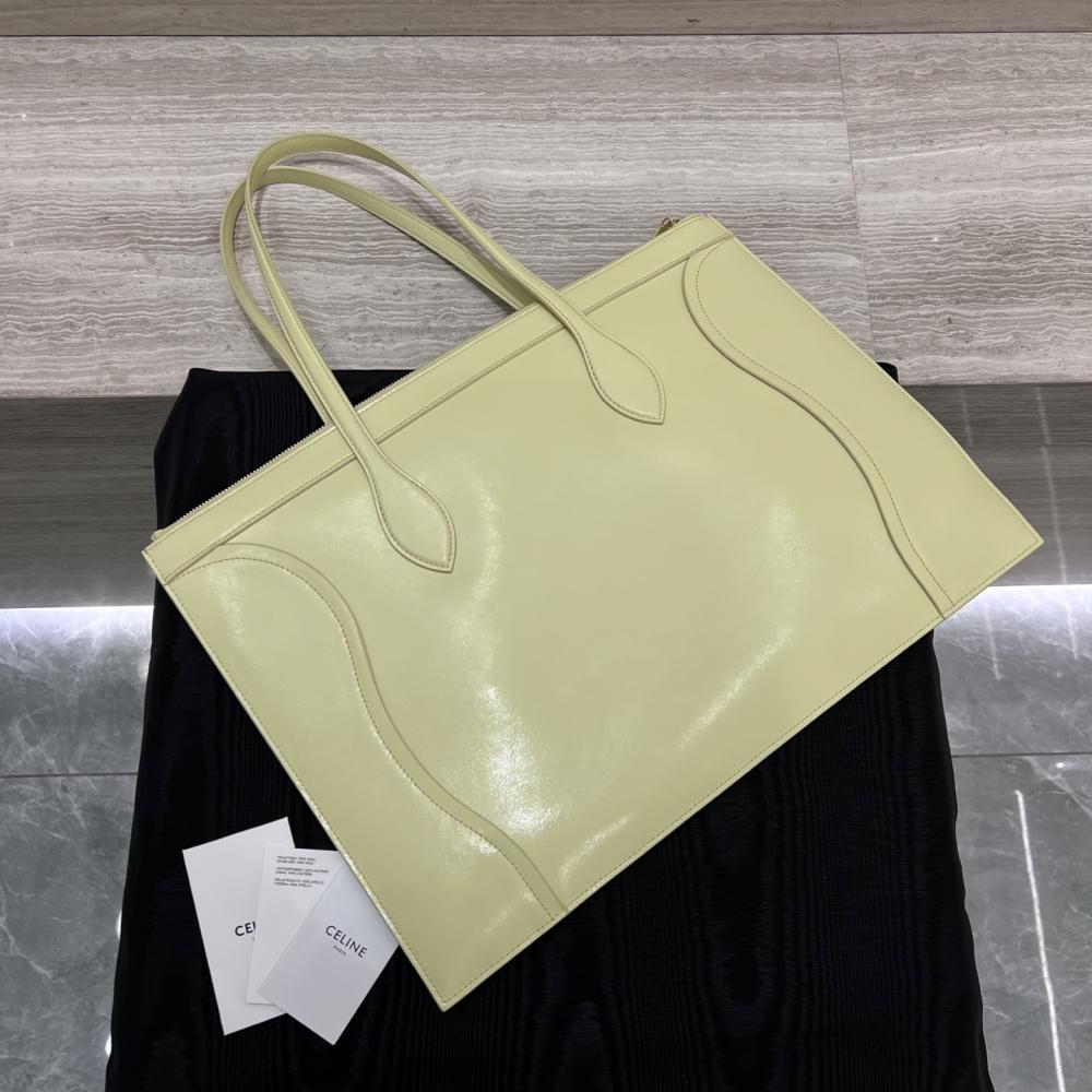 حقيبة سفر جديدة من جلد العجل اللامع من CELINE Flat Cabas – لون الحمضيات