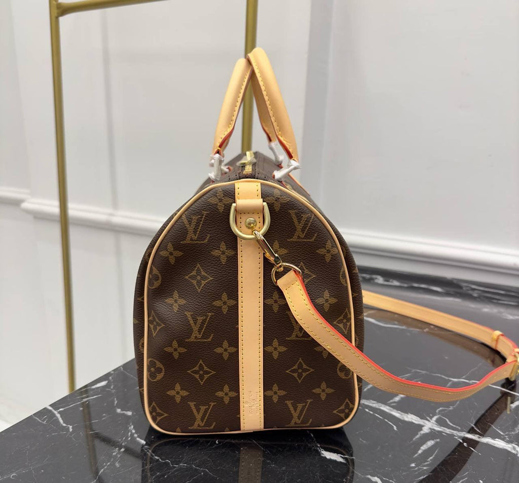 Louis Vuitton
Speedy Bandouliere 30 - Glimmer of Luxury