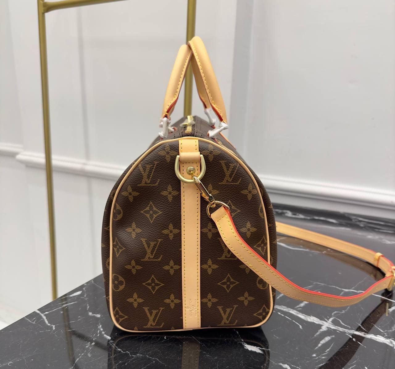 Louis Vuitton
Speedy Bandouliere 30 - Glimmer of Luxury