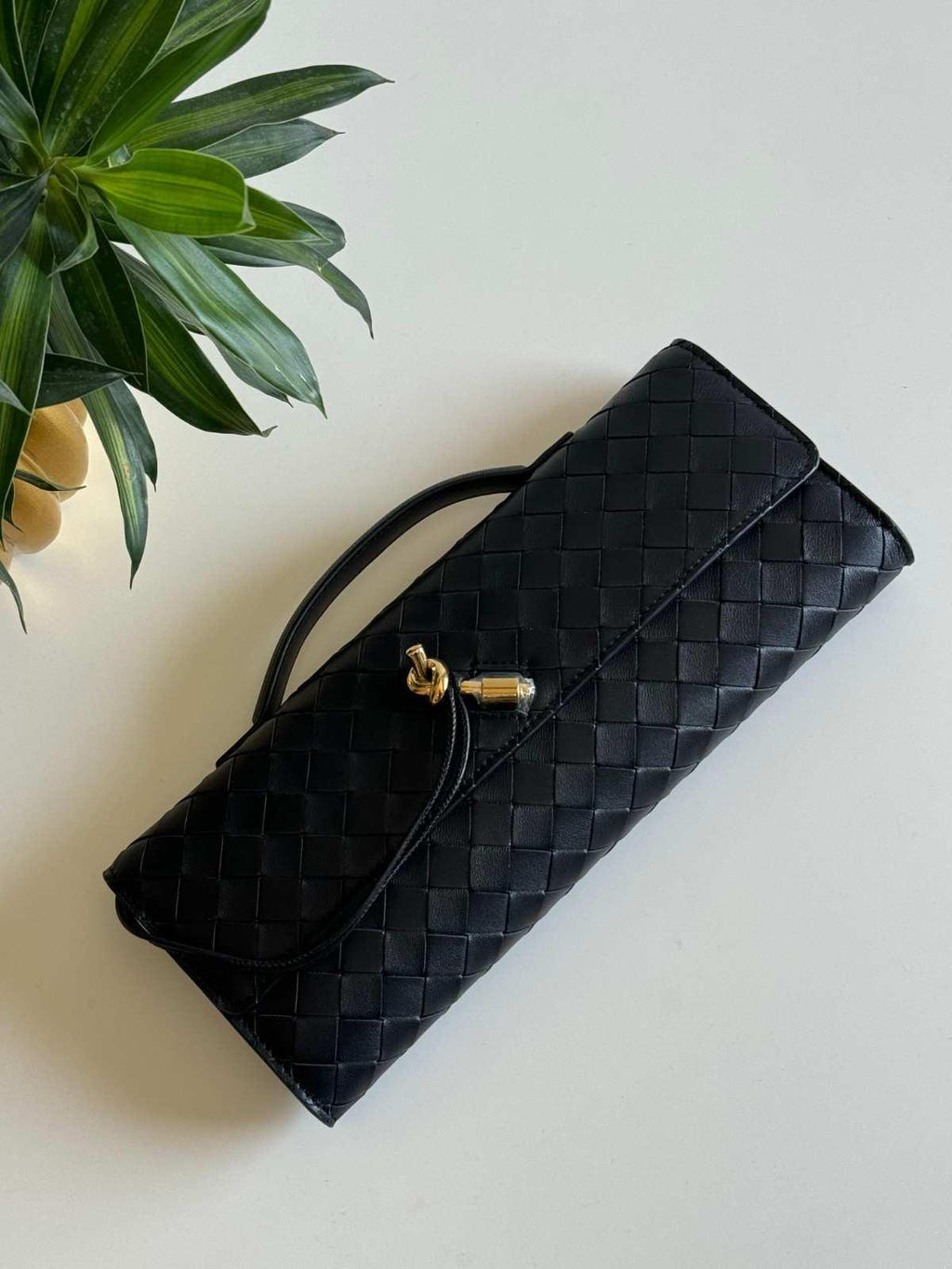 Bottega Veneta Andiamo Clutch - Glimmer of Luxury