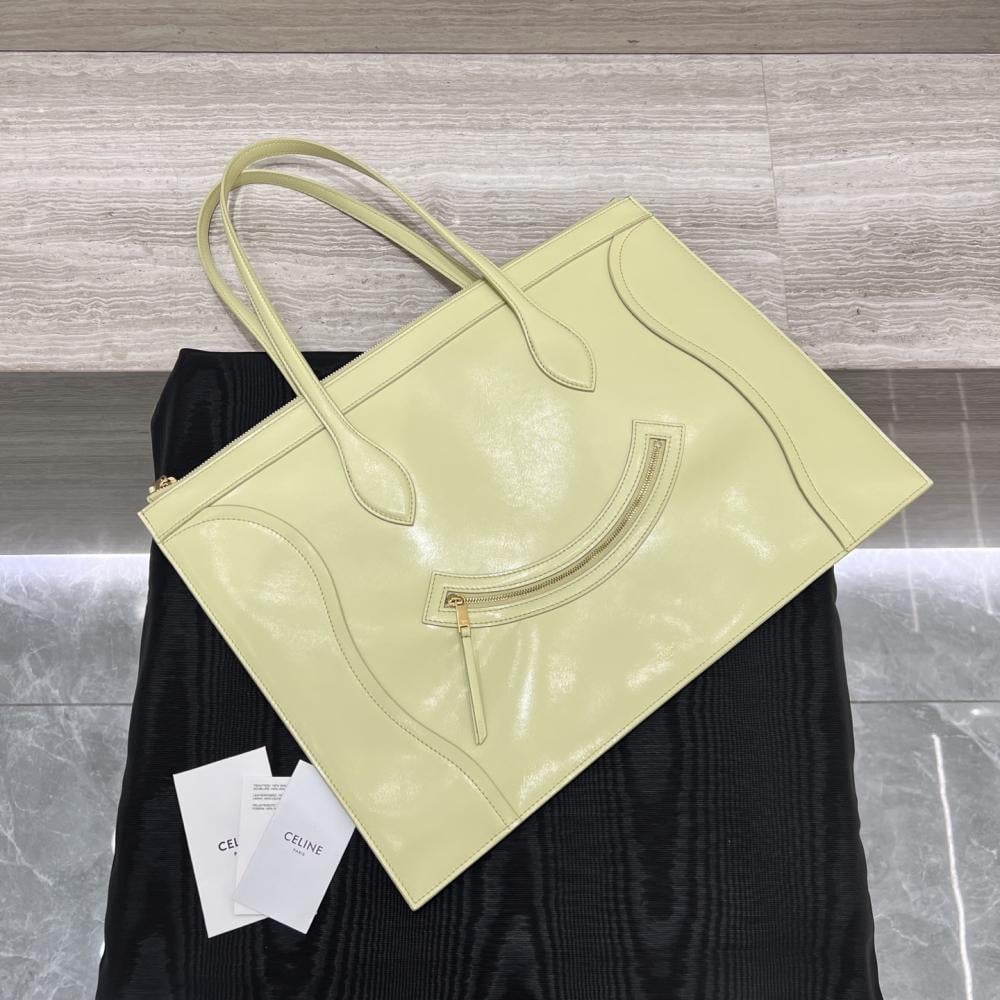 حقيبة سفر جديدة من جلد العجل اللامع من CELINE Flat Cabas – لون الحمضيات