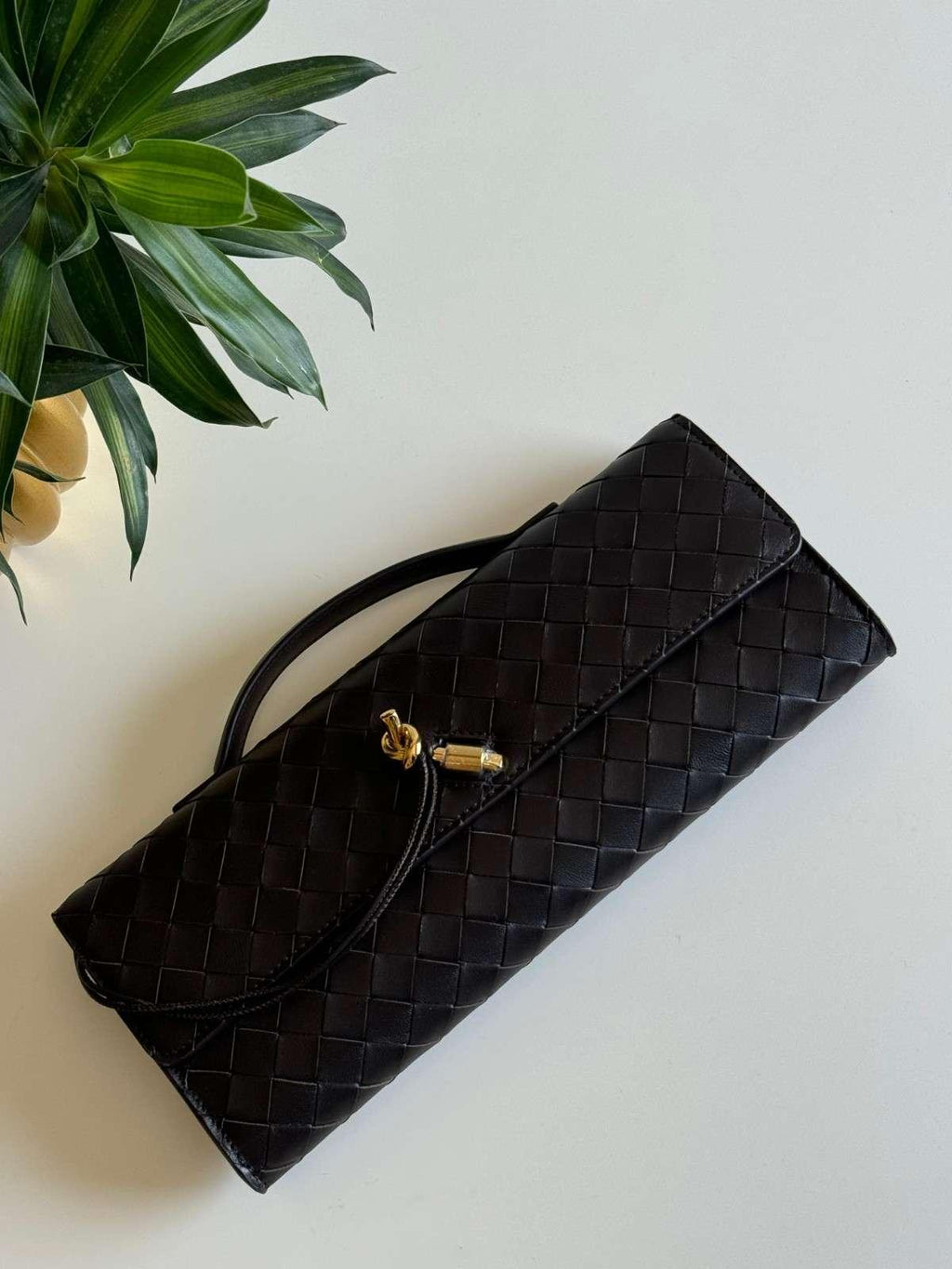 Bottega Veneta Andiamo Clutch - Glimmer of Luxury