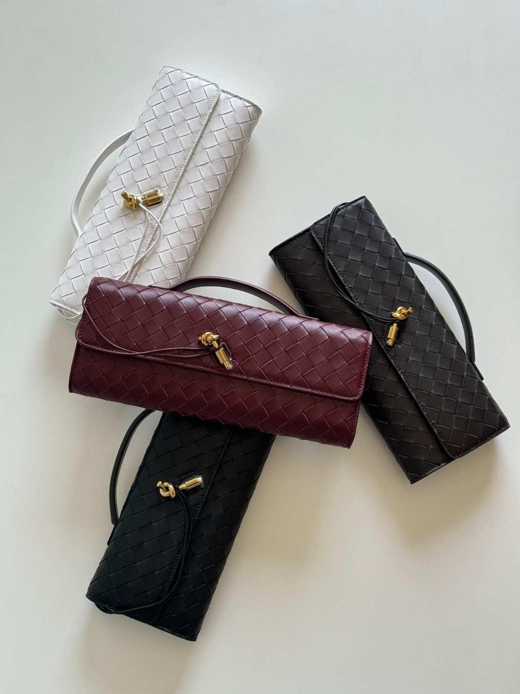Bottega Veneta Andiamo Clutch - Glimmer of Luxury
