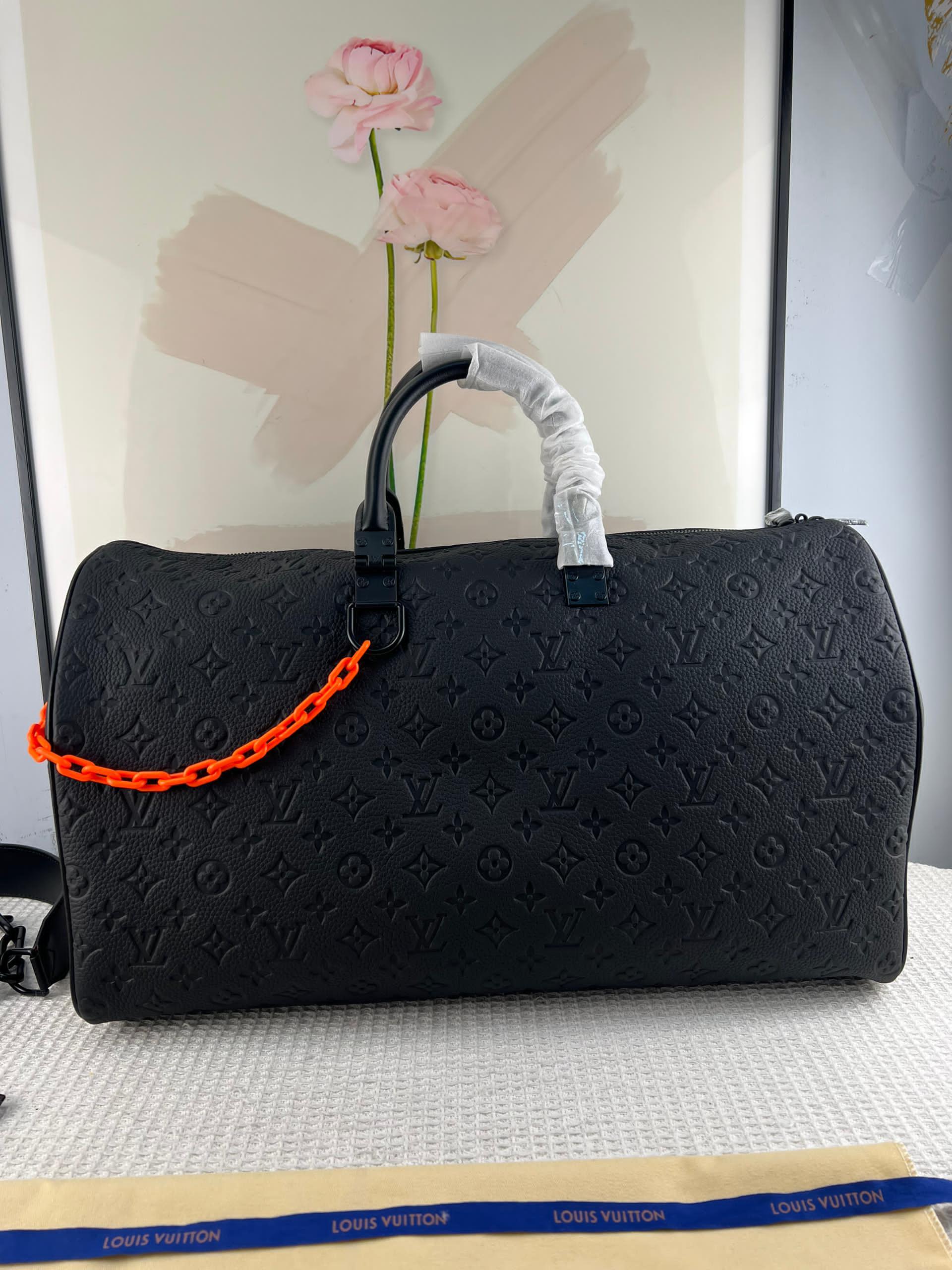 KEEPALL 50 ÇAPRAZ GÖVDELİ SEYAHAT ÇANTASI Louis Vuitton - Glimmer of Luxury