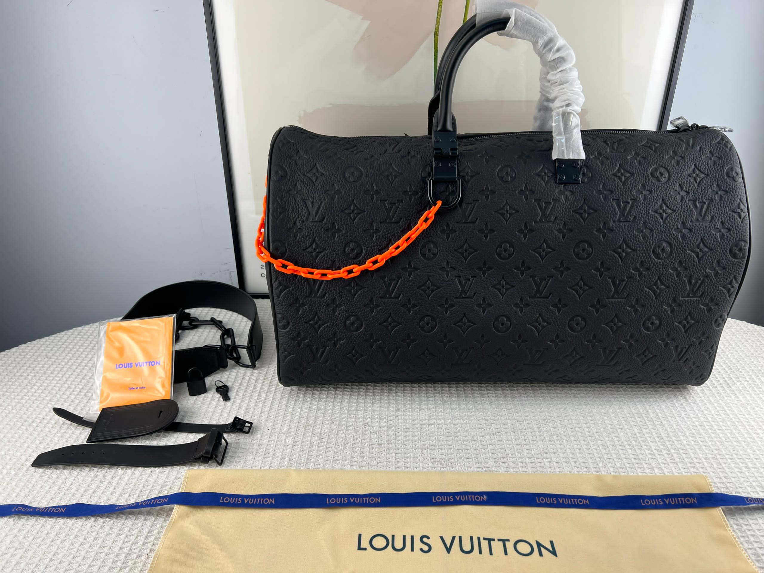 KEEPALL 50 ÇAPRAZ GÖVDELİ SEYAHAT ÇANTASI Louis Vuitton - Glimmer of Luxury