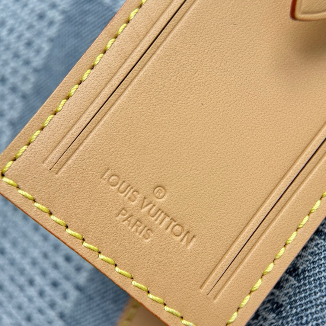 LV Keepall Bandoulière 50 - Glimmer of Luxury