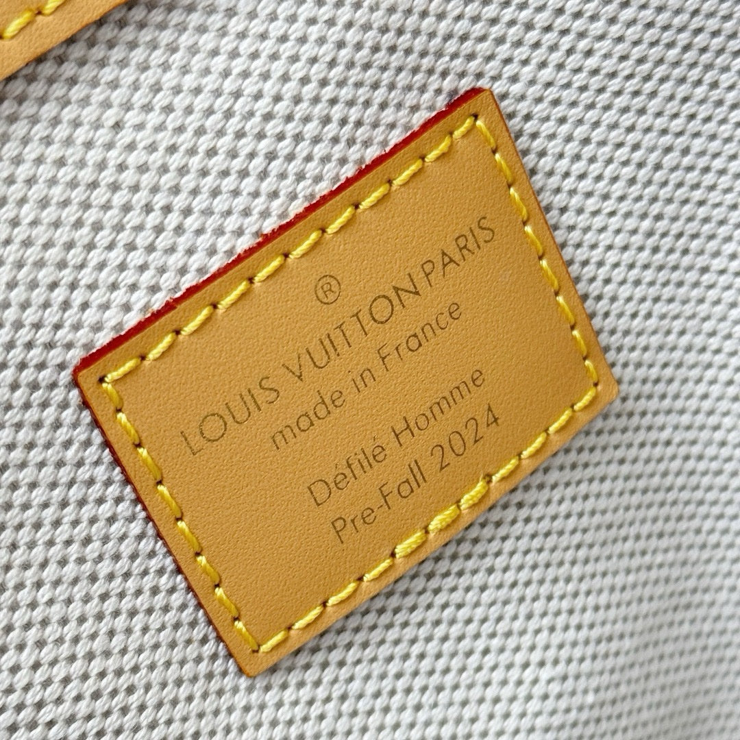 LV Keepall Bandoulière 50 - Glimmer of Luxury