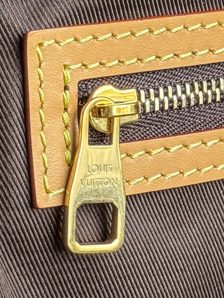 LV Keepall Bandoulière - Glimmer of Luxury