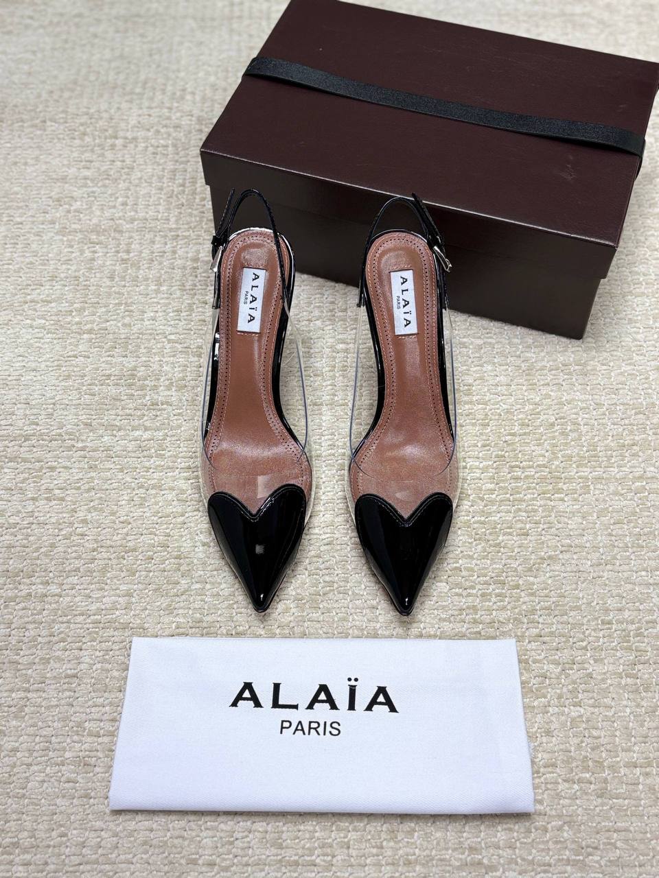 ALAIA LE CŒUR Open Back Open Back in Patent Lambskin