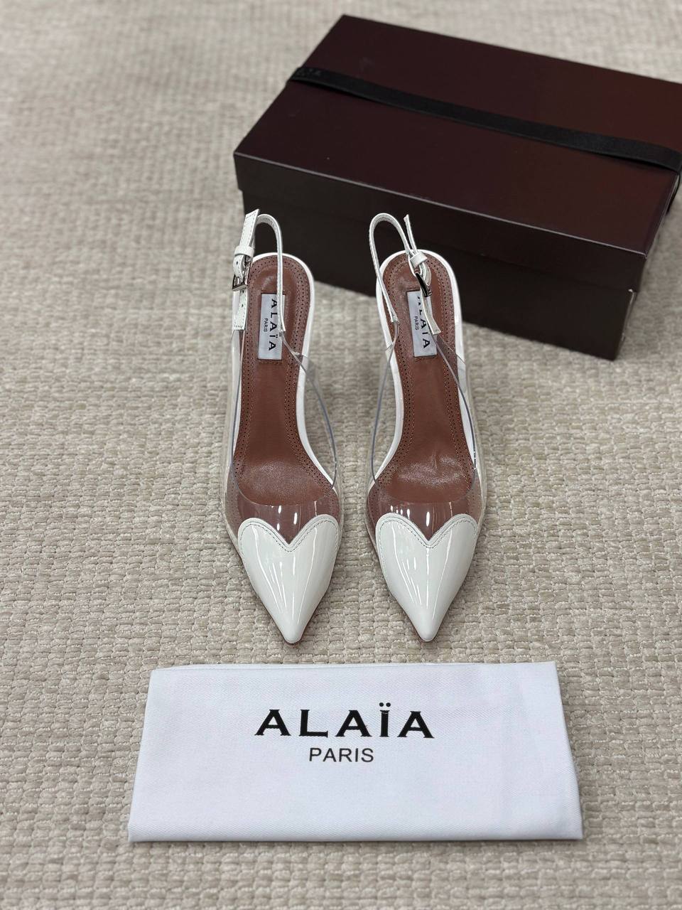 ALAIA LE CŒUR Open Back Open Back in Patent Lambskin