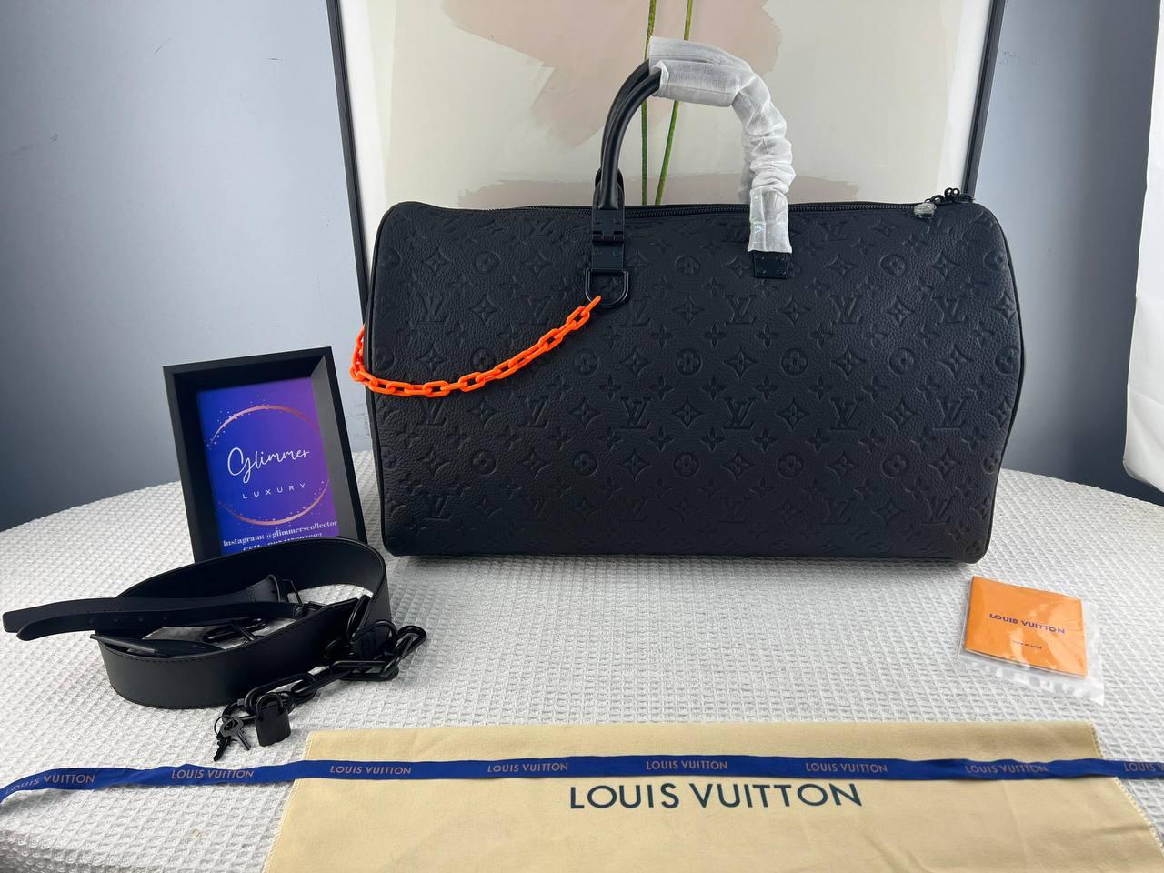 KEEPALL 50 ÇAPRAZ GÖVDELİ SEYAHAT ÇANTASI Louis Vuitton - Glimmer of Luxury