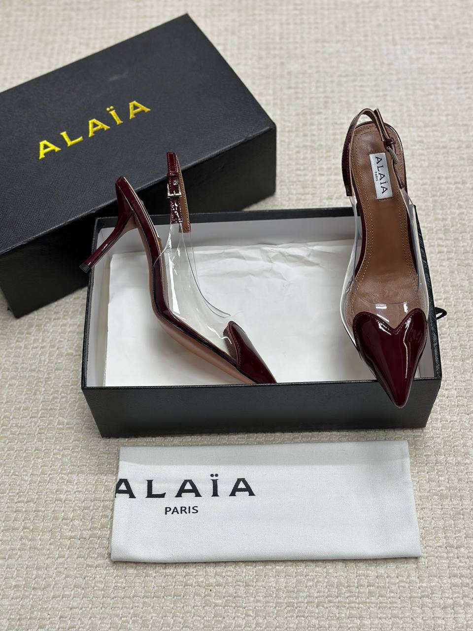 ALAIA LE CŒUR Open Back Open Back in Patent Lambskin