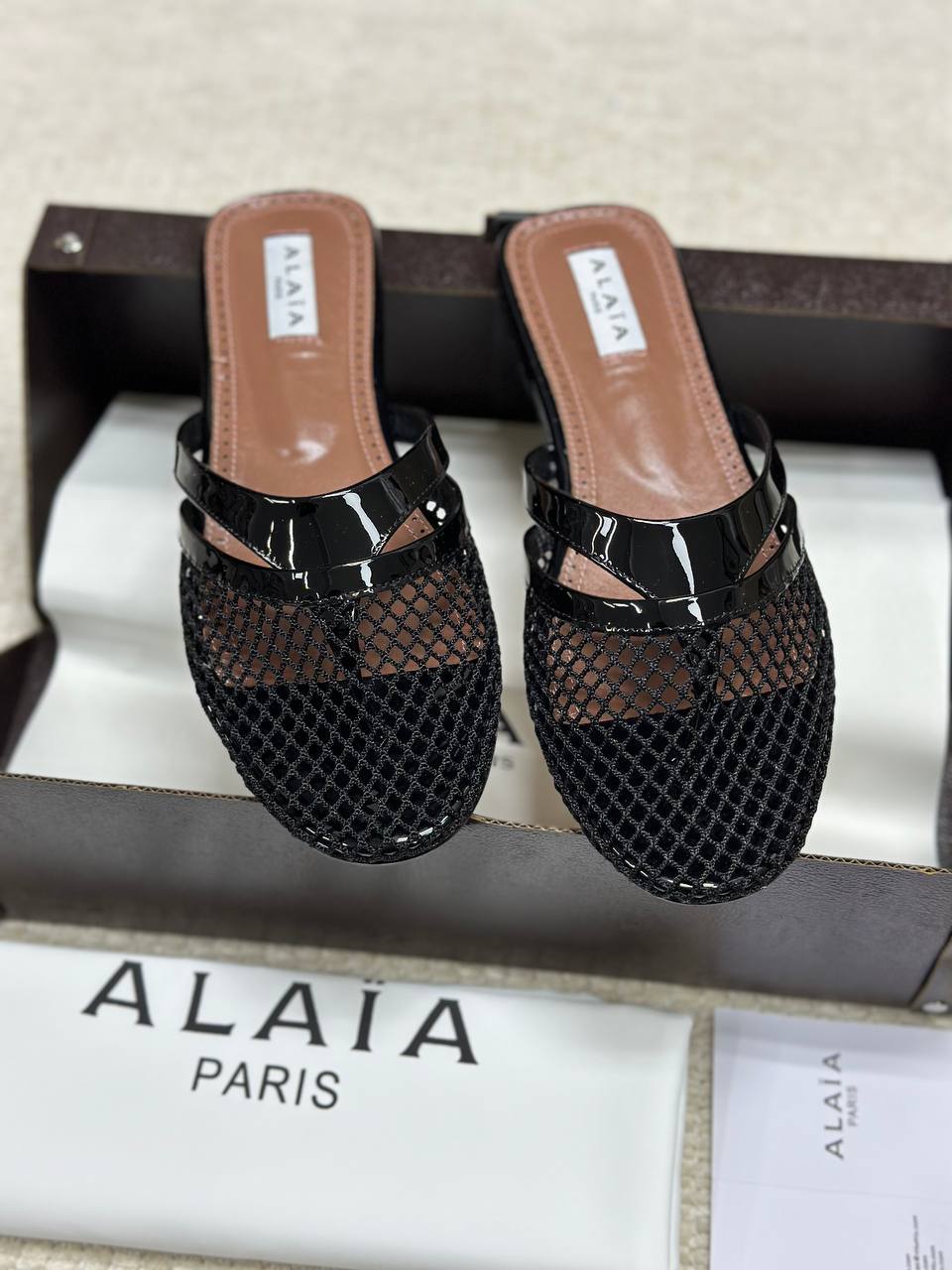 Alaia Infradito Flat Slippers