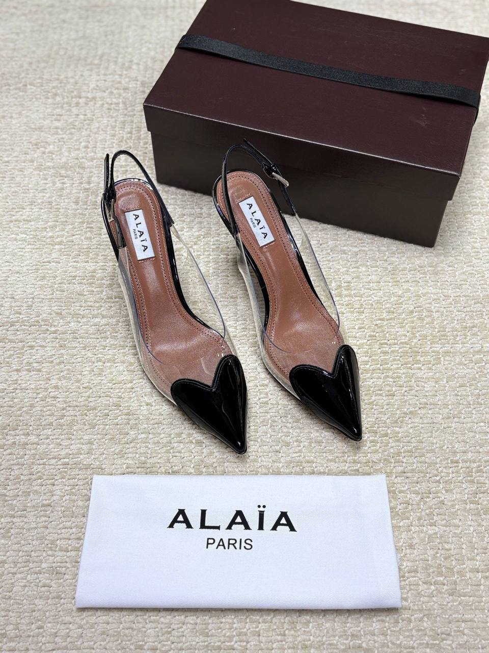 ALAIA LE CŒUR Open Back Open Back in Patent Lambskin