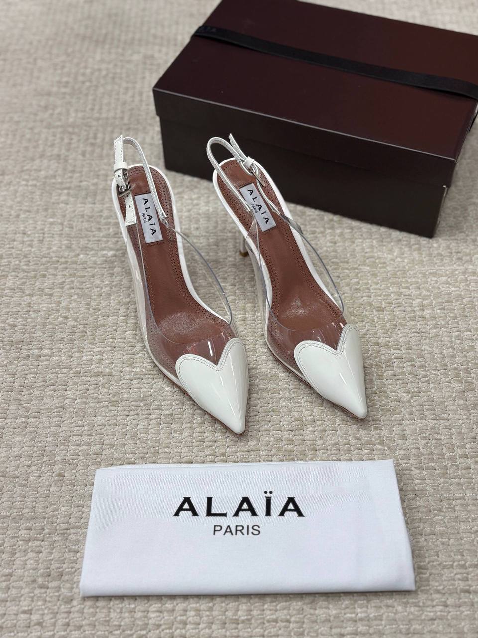 ALAIA LE CŒUR Open Back Open Back in Patent Lambskin