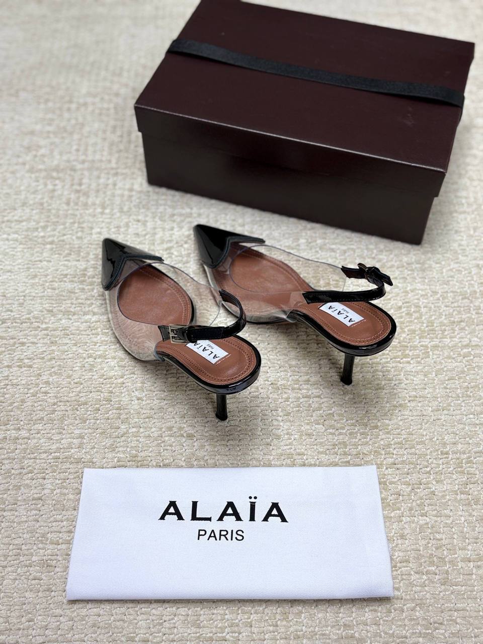 ALAIA LE CŒUR Open Back Open Back in Patent Lambskin