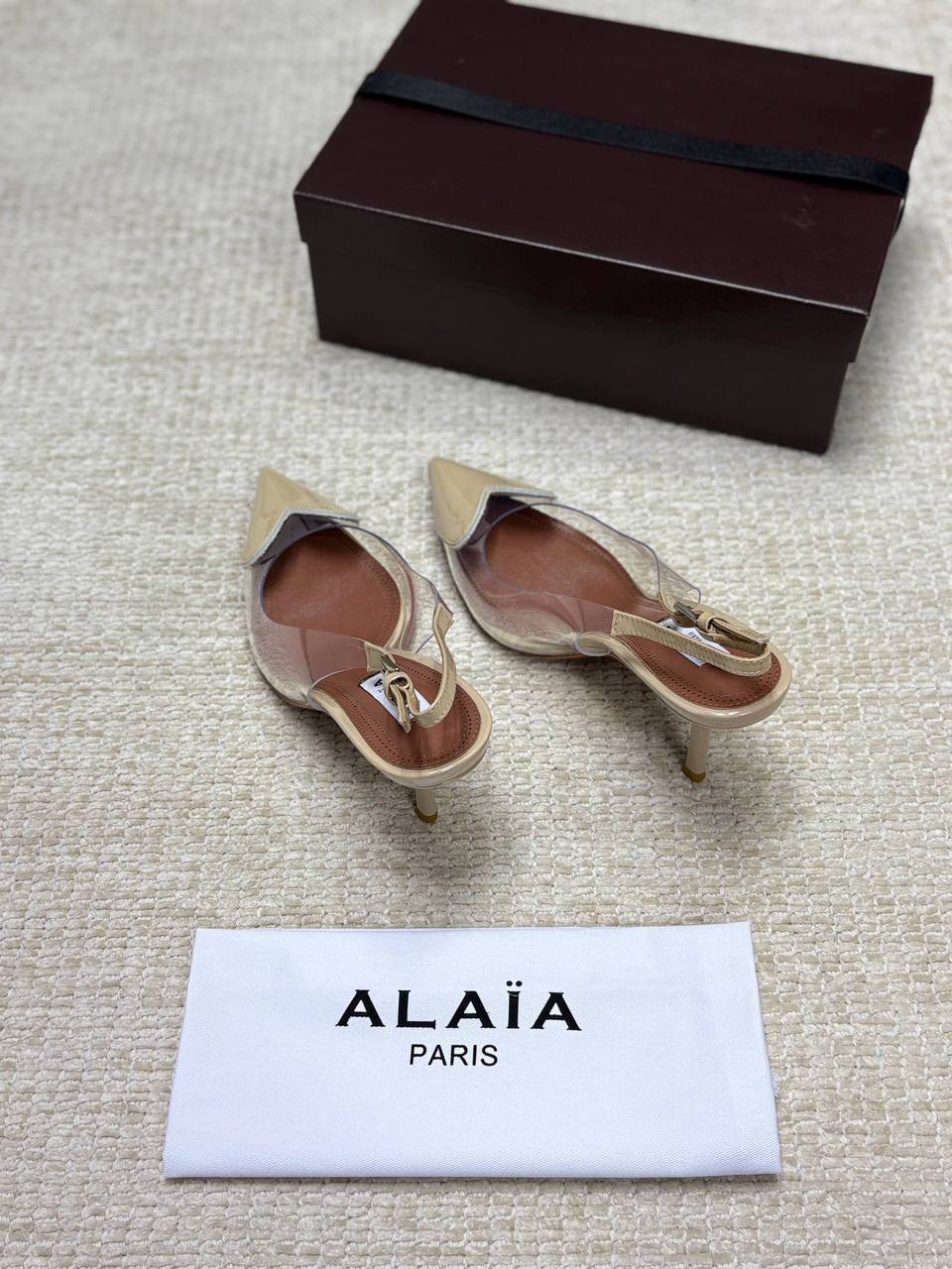 ALAIA LE CŒUR Open Back Open Back in Patent Lambskin