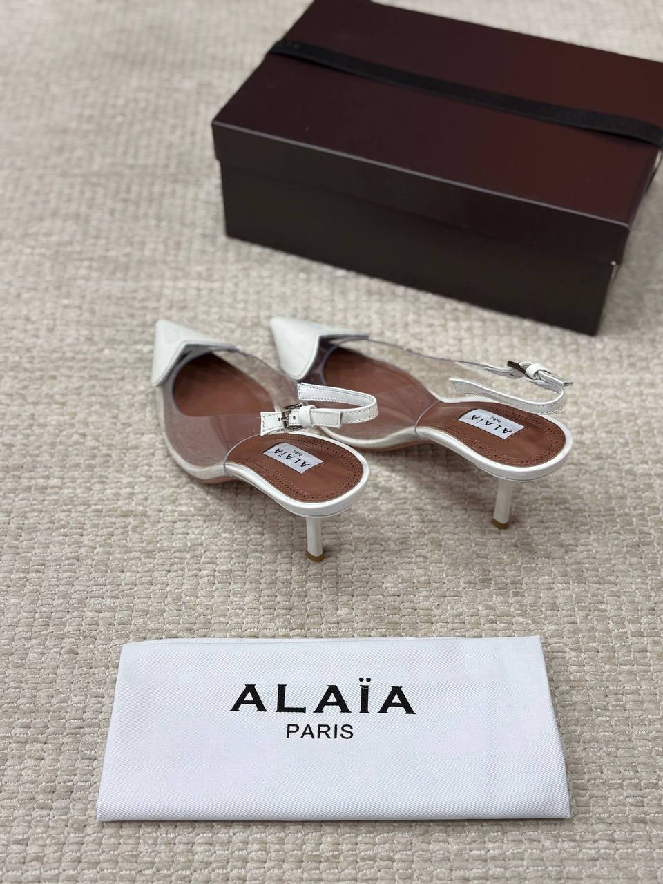 ALAIA LE CŒUR Open Back Open Back in Patent Lambskin