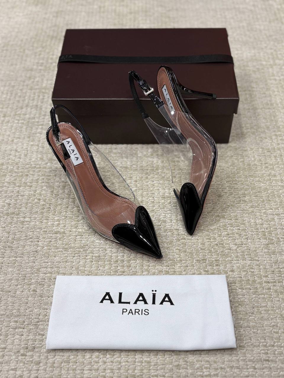ALAIA LE CŒUR Open Back Open Back in Patent Lambskin