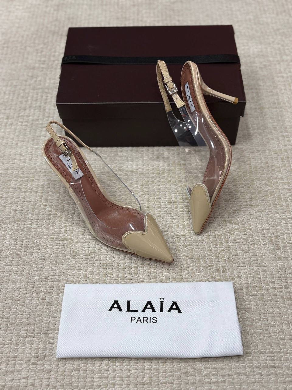 ALAIA LE CŒUR Open Back Open Back in Patent Lambskin