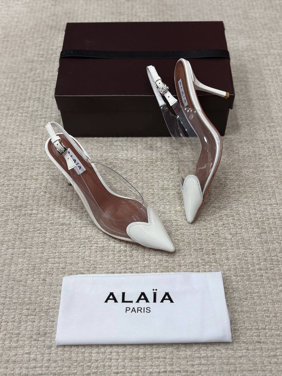 ALAIA LE CŒUR Open Back Open Back in Patent Lambskin