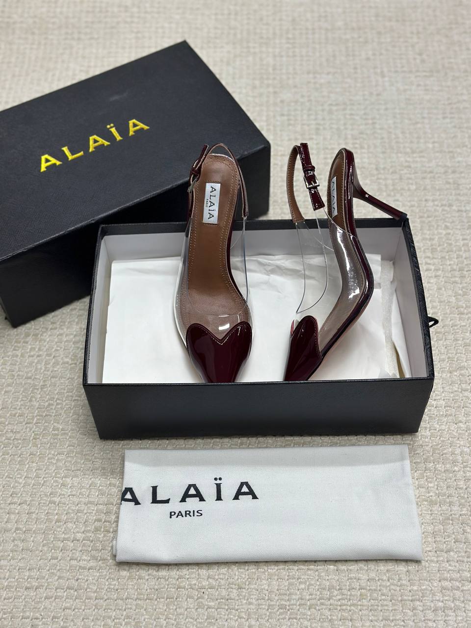 ALAIA LE CŒUR Open Back Open Back in Patent Lambskin