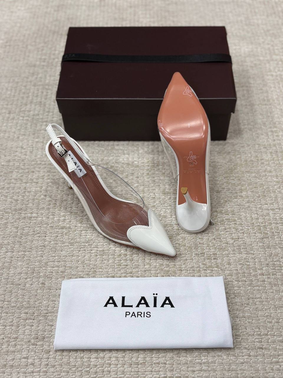 ALAIA LE CŒUR Open Back Open Back in Patent Lambskin