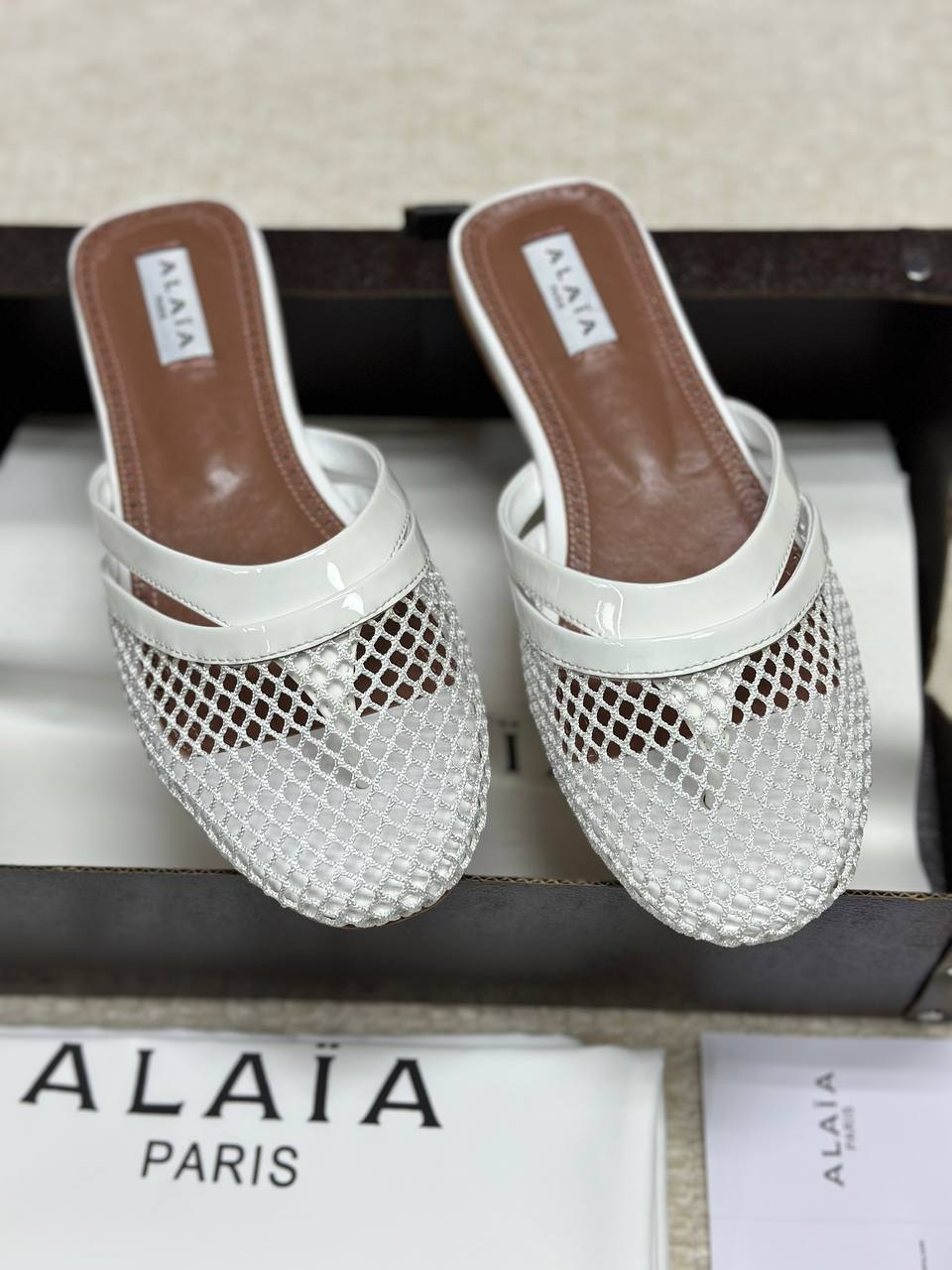 Alaia Infradito Flat Slippers